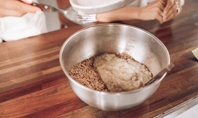 Girls bake oatmeal cookies at home