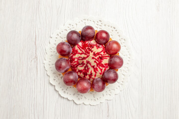 top view delicious cake with grapes on white background biscuit dessert pie