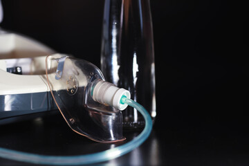 Inhalation with nebulizer at home. Asthma inhaler inhalation nebulizer steam sick cough concept flu...