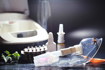 Inhalation with nebulizer at home. Asthma inhaler inhalation nebulizer steam sick cough concept flu...