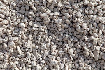 Stone gravel at a construction site as a background.