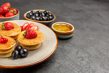 front view yummy pancakes little formed with fruits on a grey background pie cake fruit