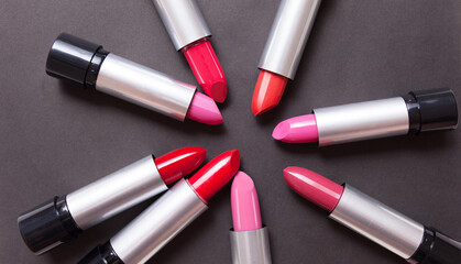 Obraz premium red lipstick on a black background