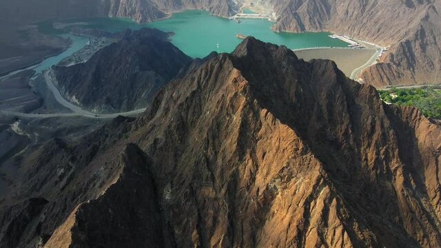 Revealing view of Hatta Dam Lake in eastern region of Dubai, United Arab Emirates aerial view