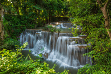 HUAY-MAE-KHA-MIN waterfall in the forest on the morning with sun rise