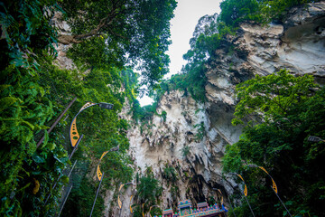 The famous and iconic limestone with rainbow colored stairs at Murugan Temple Batu Caves becomes a new attraction for tourism in Malaysia.