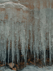 with the onset of cold weather, ice shards formed on the coastal rocks