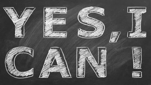 Yes I Can. Business motivational inspirational quotes. Illustration hand drawn in chalk on a blackboard. Words of motivation. Concept of ability and possibility. Seamless loop video.