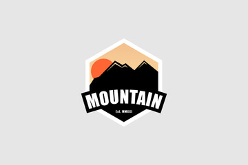 Abstract Mountain Logo. Black Silhouette Mountain with Hexagon Shape Frame on Vintage Background. Use for Adventure Logos. Vector Logo Concept.