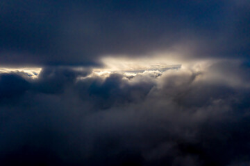 Fototapeta na wymiar Wolkenaufnahmen aus der Luft