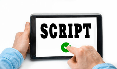 Closeup of a male hands holding tablet pc with word Script