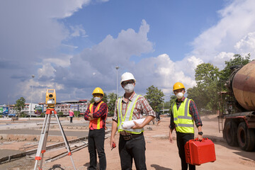Surveyor engineer worker making measuring with theodolite on road works.survey engineer in construction site.