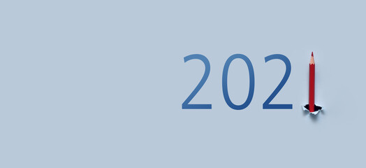 The inscription 2021 and a red pencil instead of the number 1.The coming of 2021, the expectation of the holiday. New Creative Year