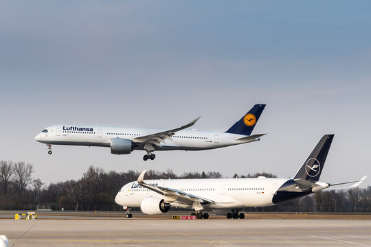 Lufthansa Airbus A350-941 with the aircraft registration D-AIXA in the approach to the northern runway 26R of the Munich Airport MUC EDDM