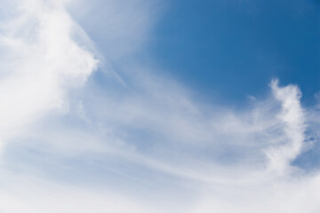 White cirrocumulus cloud wave in the blue sky background