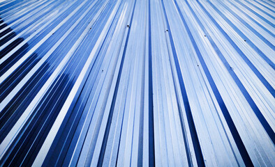 Blue corrugated metal sheet texture. Phonephotography. 