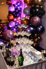 Glasses slide with champagne on Holiday, Birthday, party in restaurant