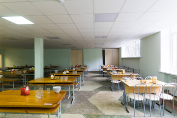 Chairs and tables. The dining hall in school is quarantined, isolation.