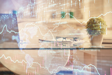 Double exposure of financial graph drawing and office interior background. Concept of stock market.