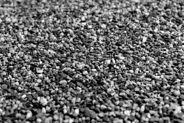 Gray gravel stones background. Gravel stones for the construction industry