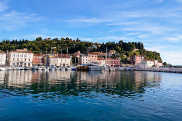 Fototapeta na wymiar A beautiful embankment of the town of Piran on the shores of the Adriatic Sea.