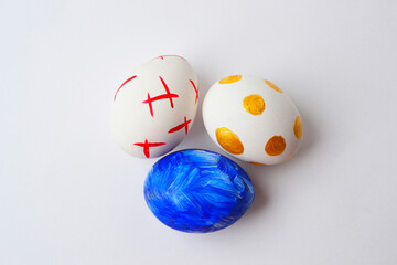 colorful easter eggs on gray background. Easter eggs. 3 Easter eggs on a gray background