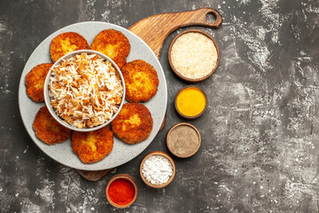 top view tasty fried cutlets with seasonings on dark background meat rissole dish