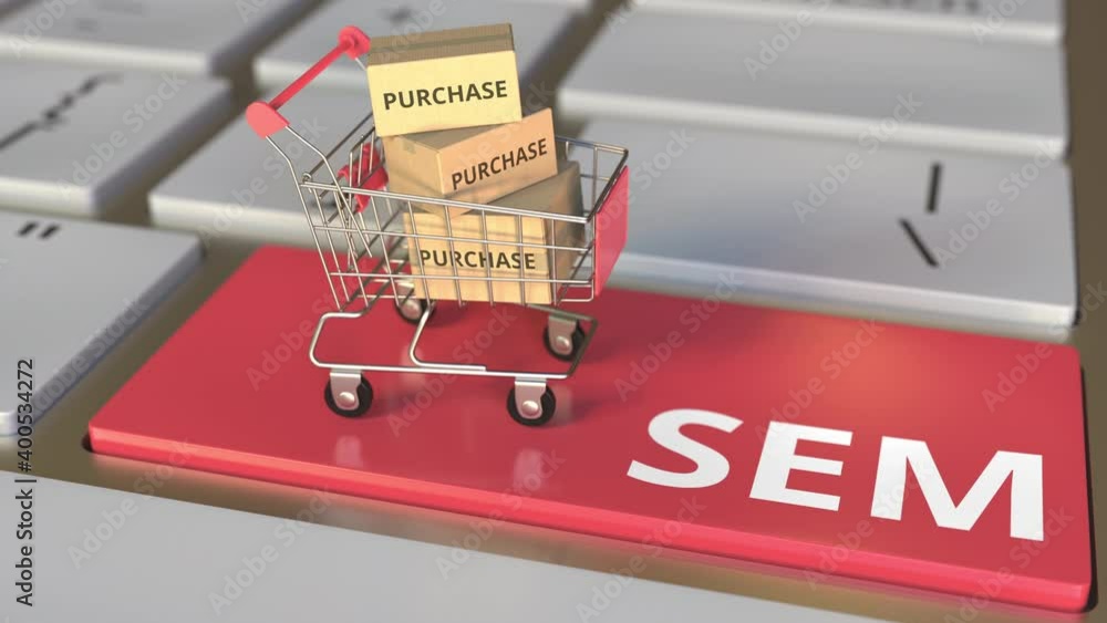 Poster sem or search engine marketing text on computer keyboard and boxes in small shopping cart. electroni