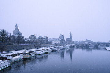 Winter view of Dresden old town.  Panorama with snowfall of the old town in Dresden, Germany.