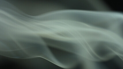 Real soft smoke on black background photo, still. Backdrop, wallpaper, elegant beautiful smoke effect for web design, banners, titles, texts and etc.