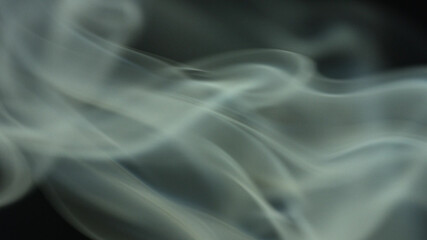 Real soft smoke on black background photo, still. Backdrop, wallpaper, elegant beautiful smoke effect for web design, banners, titles, texts and etc.