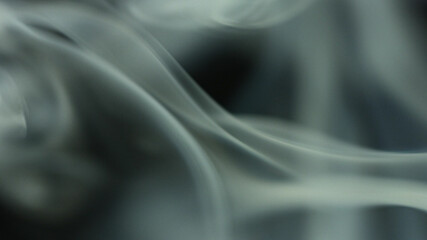 Real soft smoke on black background photo, still. Backdrop, wallpaper, elegant beautiful smoke effect for web design, banners, titles, texts and etc.