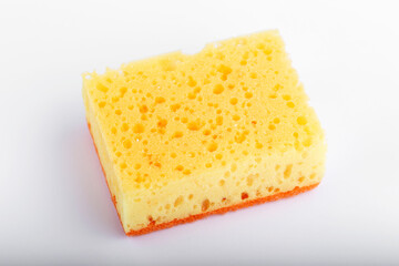 Dishwashing sponge yellow orange isolated white background.