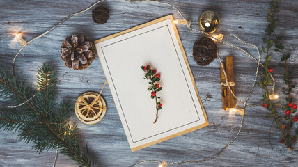 Christmas card on a white wooden background with decorations