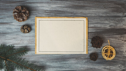 Christmas card on a white wooden background with decorations