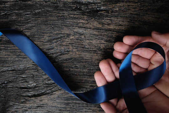 Symbol dark blue Ribbon isolated on a white background. Bowel