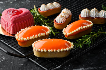 Sweet mini tart with orange cream. Baking. Top view. Sweets.