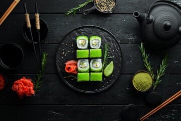 Green Sushi Rolls - With Tobiko Green Caviar and Shrimp. Traditional Japanese cuisine. Top view.