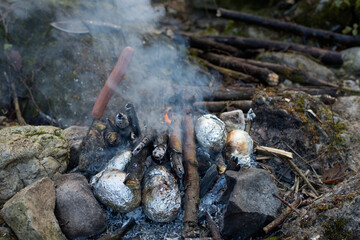 Cooking food in the open air. Camping.
