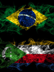 Brazil, Brazilian vs Comoros, Comorian smoky mystic flags placed side by side. Thick colored silky abstract smoke flags.