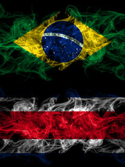 Brazil, Brazilian vs Costa Rica smoky mystic flags placed side by side. Thick colored silky abstract smoke flags.