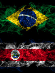 Brazil, Brazilian vs Costa Rica, coat smoky mystic flags placed side by side. Thick colored silky abstract smoke flags.
