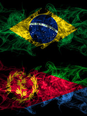Brazil, Brazilian vs Eritrea, Eritrean smoky mystic flags placed side by side. Thick colored silky abstract smoke flags.