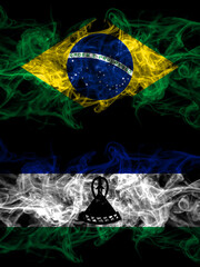 Brazil, Brazilian vs Lesotho smoky mystic flags placed side by side. Thick colored silky abstract smoke flags.