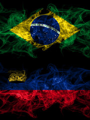 Brazil, Brazilian vs Liechtenstein smoky mystic flags placed side by side. Thick colored silky abstract smoke flags.