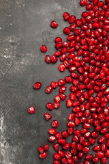 top view pomegranate seeds on dark background