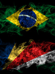 Brazil, Brazilian vs Seychelles, Seychellois smoky mystic flags placed side by side. Thick colored silky abstract smoke flags.