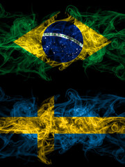 Brazil, Brazilian vs Sweden, Swedish Swede smoky mystic flags placed side by side. Thick colored silky abstract smoke flags.