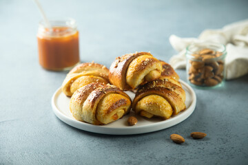 Homemade pumpkin buns with almond and jam