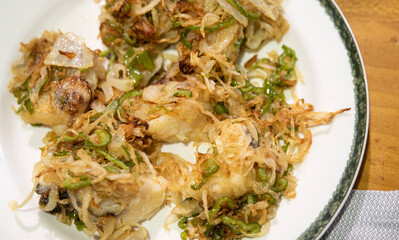 plate of cod with peppers